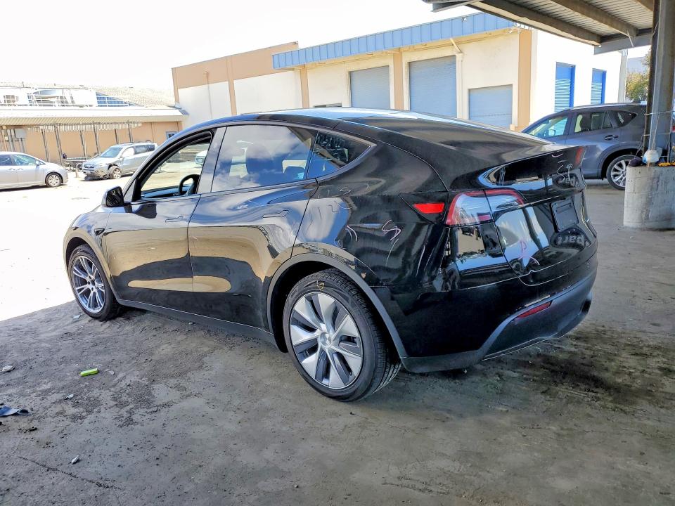 2023 Tesla Model y VIN 7SAYGDEE2PF892342 COPART salvage auction — SIDE, CA - SALVAGE CERTIFICATE, sold $7,800 on 2026-07-21 (photo 2)