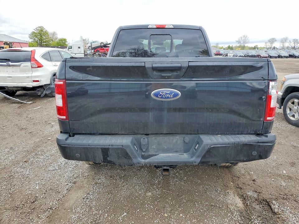 2018 Ford F-150 lightning VIN 1FTFW1EG1JFC35400 COPART salvage auction — VANDALISM, On - Permit Rebuilt - Unfit, sold $10,600 on 2026-07-03 (photo 6)