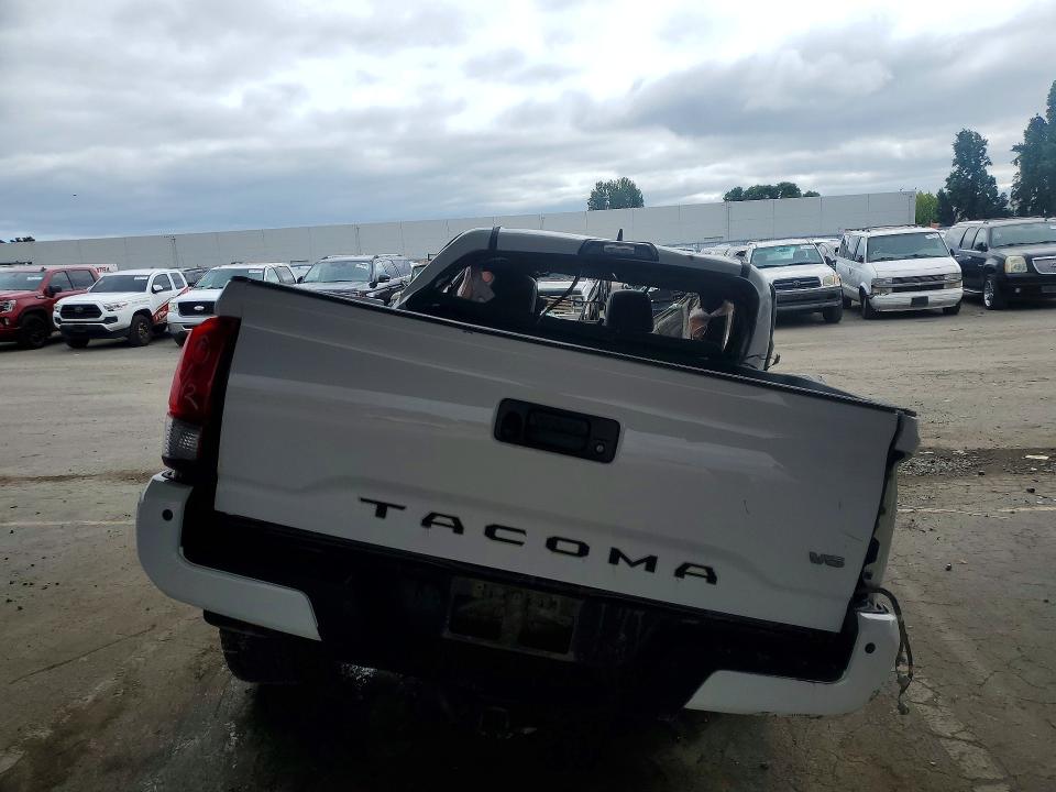 2019 Toyota Tacoma VIN 5TFCZ5AN9KX188554 COPART salvage auction — ROLLOVER, CA - NON-REPAIRABLE VEHICLE CERT, sold $300 on 2026-07-21 (photo 6)