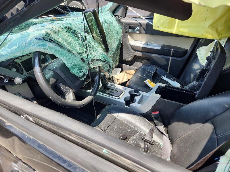 2010 Mercury Mariner VIN 4M2CN9H70AKJ04623 COPART salvage auction — ROLLOVER, Tx - Salvage Vehicle Title, sold $250 on 2026-07-02 (photo 7)
