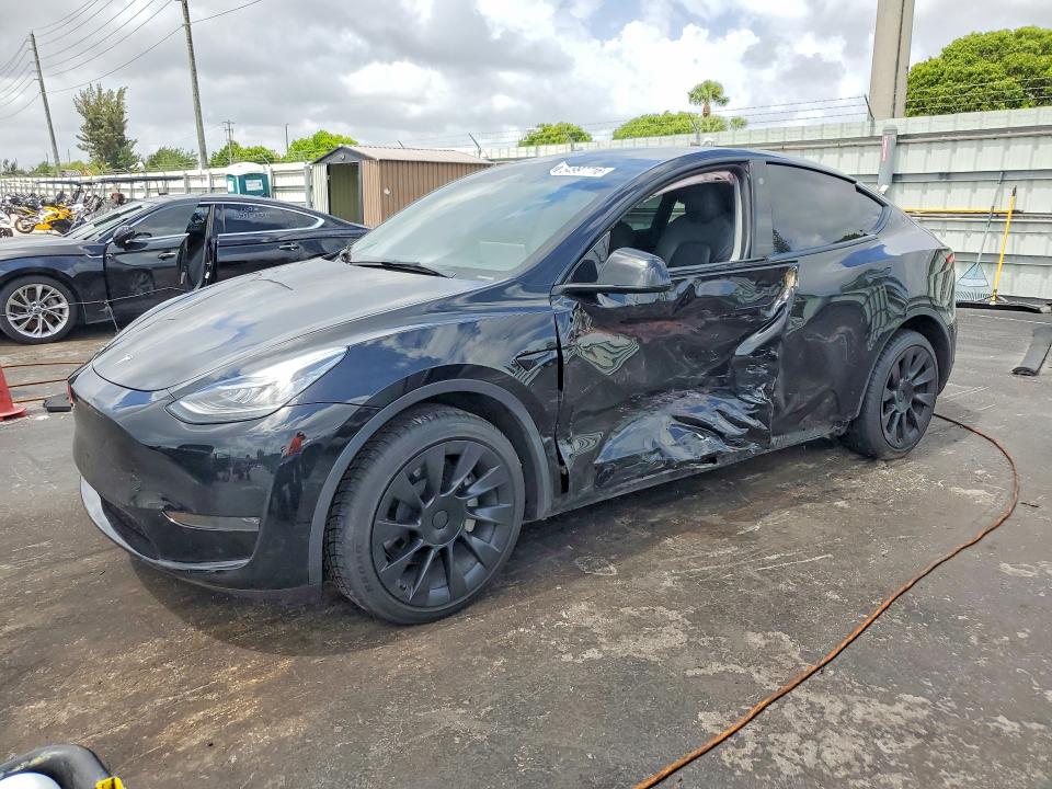 2023 Tesla Model y VIN 7SAYGDEE5PA078442 COPART salvage auction — SIDE, Fl - Cert Of Title Slvg Rebuildable, sold $11,900 on 2026-07-13 (photo 1)
