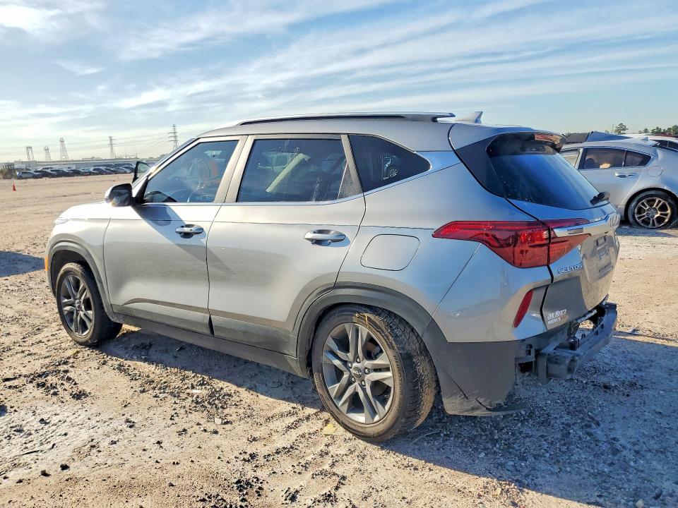 2023 Kia Seltos VIN KNDEU2AA2P7392106 COPART salvage auction — SIDE, Tx - Salvage Vehicle Title, sold $3,400 on 2026-07-21 (photo 2)