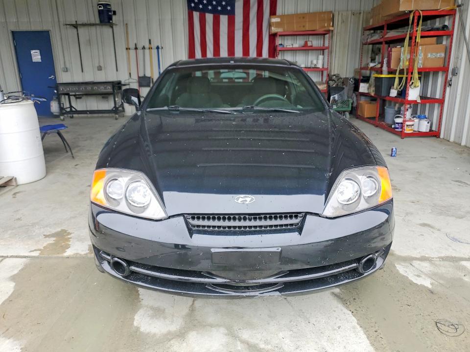 2004 Hyundai Tiburon VIN KMHHM65D04U107498 COPART salvage auction — SIDE, Nc - Salvage Certificate Of Title, sold $200 on 2026-07-08 (photo 5)