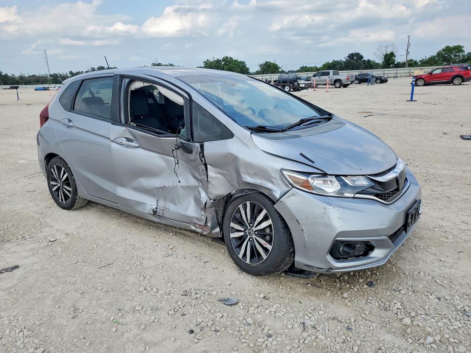 2018 Honda Fit VIN 3HGGK5H89JM717996 COPART salvage auction — SIDE, Tx - Salvage Vehicle Title, sold $2,000 on 2026-07-09 (photo 4)