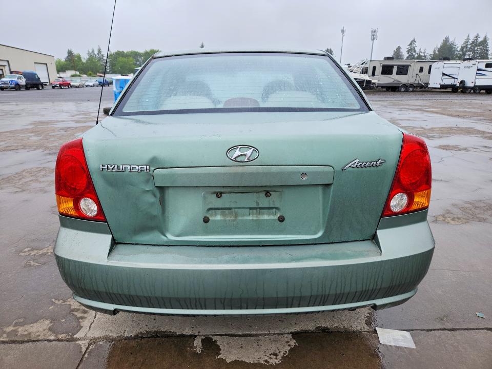 2005 Hyundai Accent VIN KMHCG45C35U585400 COPART salvage auction — ROLLOVER, Or - Salvage Title Certificate, sold $150 on 2026-07-27 (photo 6)