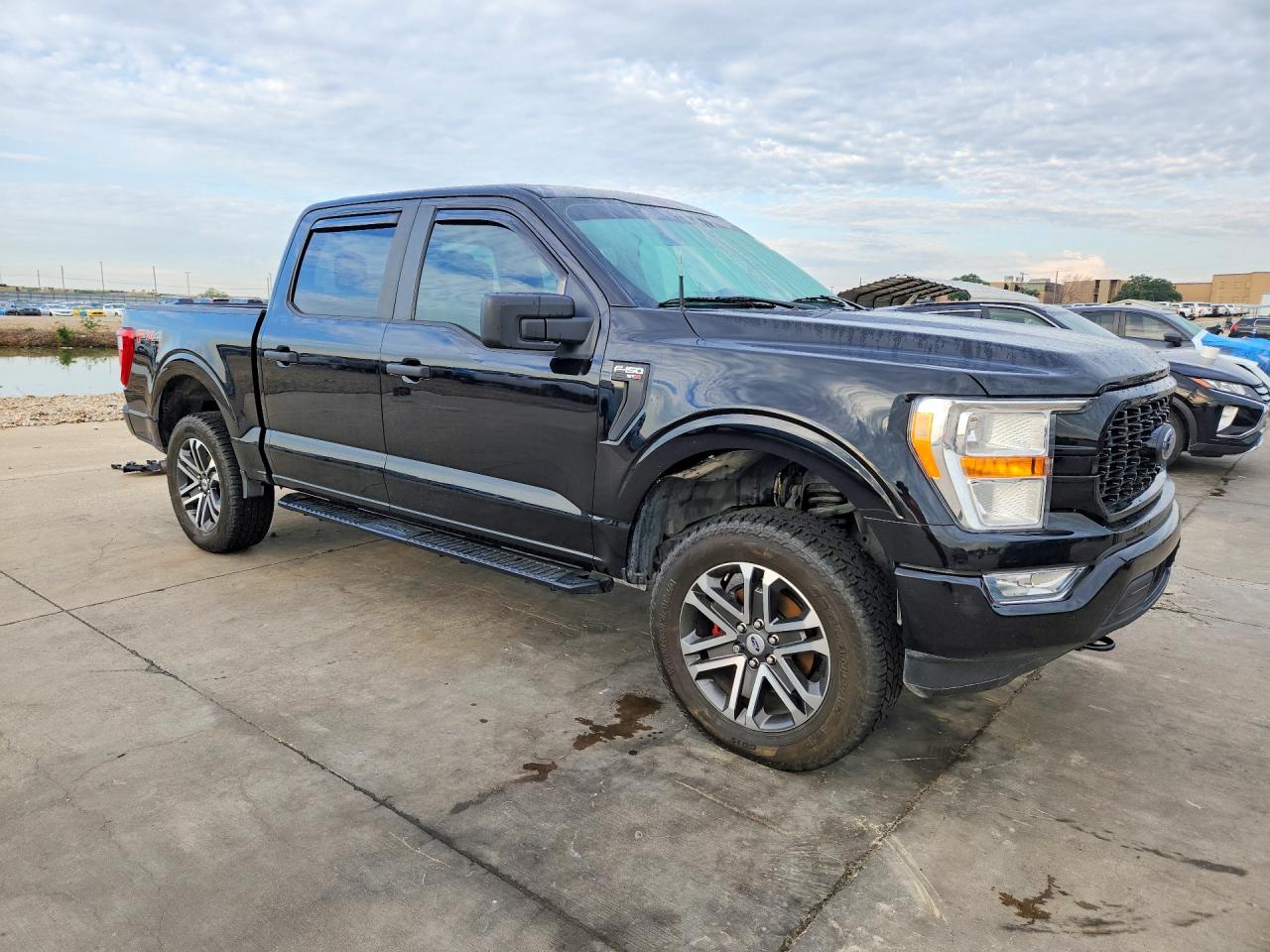 2021 Ford F-150 Lightning VIN 1FTEW1EP9MFB93316 COPART salvage auction — Hail, TX - CERTIFICATE OF TITLE, sold $10,100 on 2026-07-09 (photo 4)