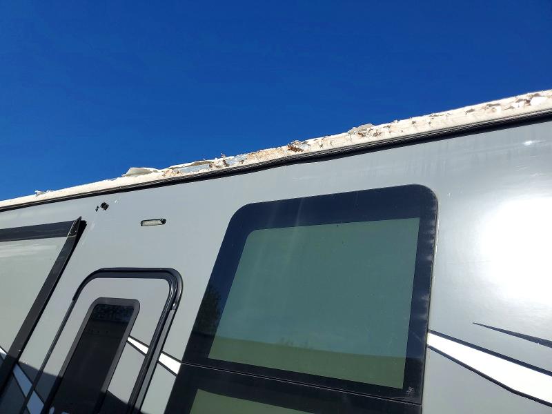 2020 Keystone Raptor VIN 4YDF42332LR800246 COPART salvage auction — ROOF, MI - CERTIFICATE OF TITLE, sold $16,200 on 2026-07-28 (photo 9)