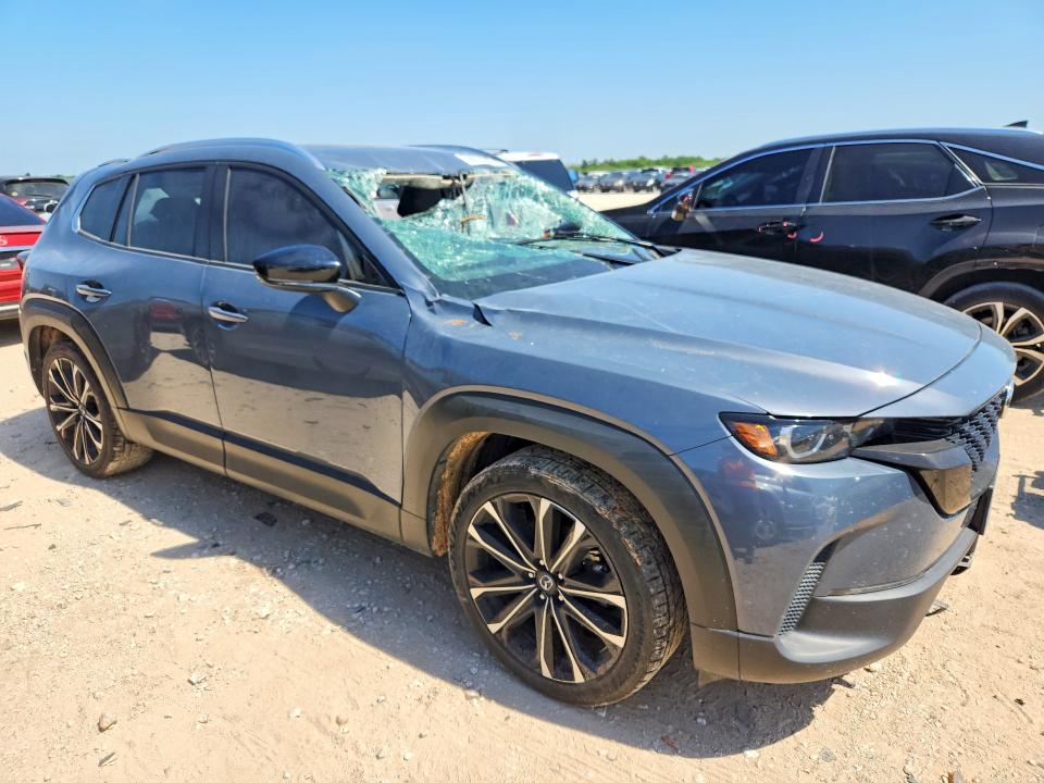 2023 Mazda VIN 7MMVABEM8PN105618 COPART salvage auction — WATER/FLOOD, Tx - Salvage Title-Flood Damage, sold $6,000 on 2026-07-02 (photo 4)