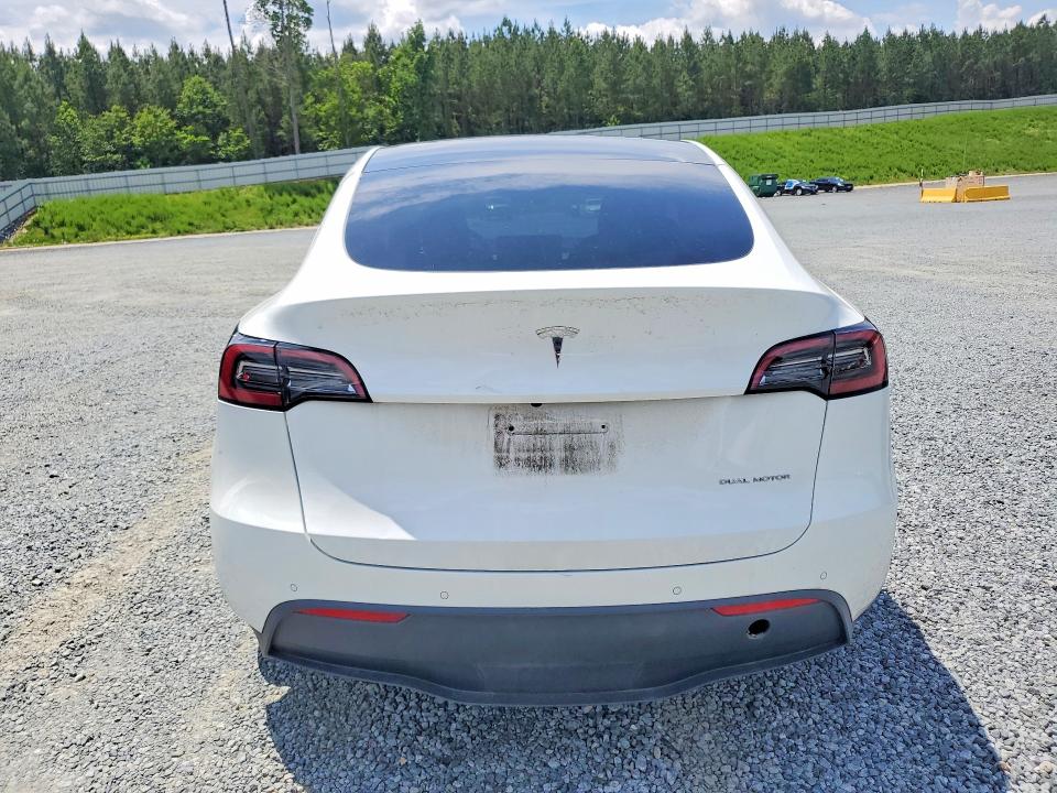 2022 Tesla Model y VIN 7SAYGDEE6NF358144 COPART salvage auction — SIDE, Nc - Salvage Certificate Of Title, sold $13,000 on 2026-07-16 (photo 6)