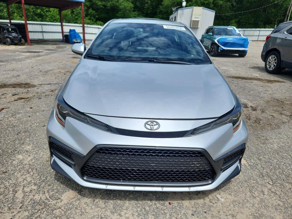 2022 Toyota Corolla VIN JTDP4MCE0NJ092410 COPART salvage auction — SIDE, Fl - Cert Of Title Slvg Rebuildable, sold $6,500 on 2026-07-10 (photo 5)