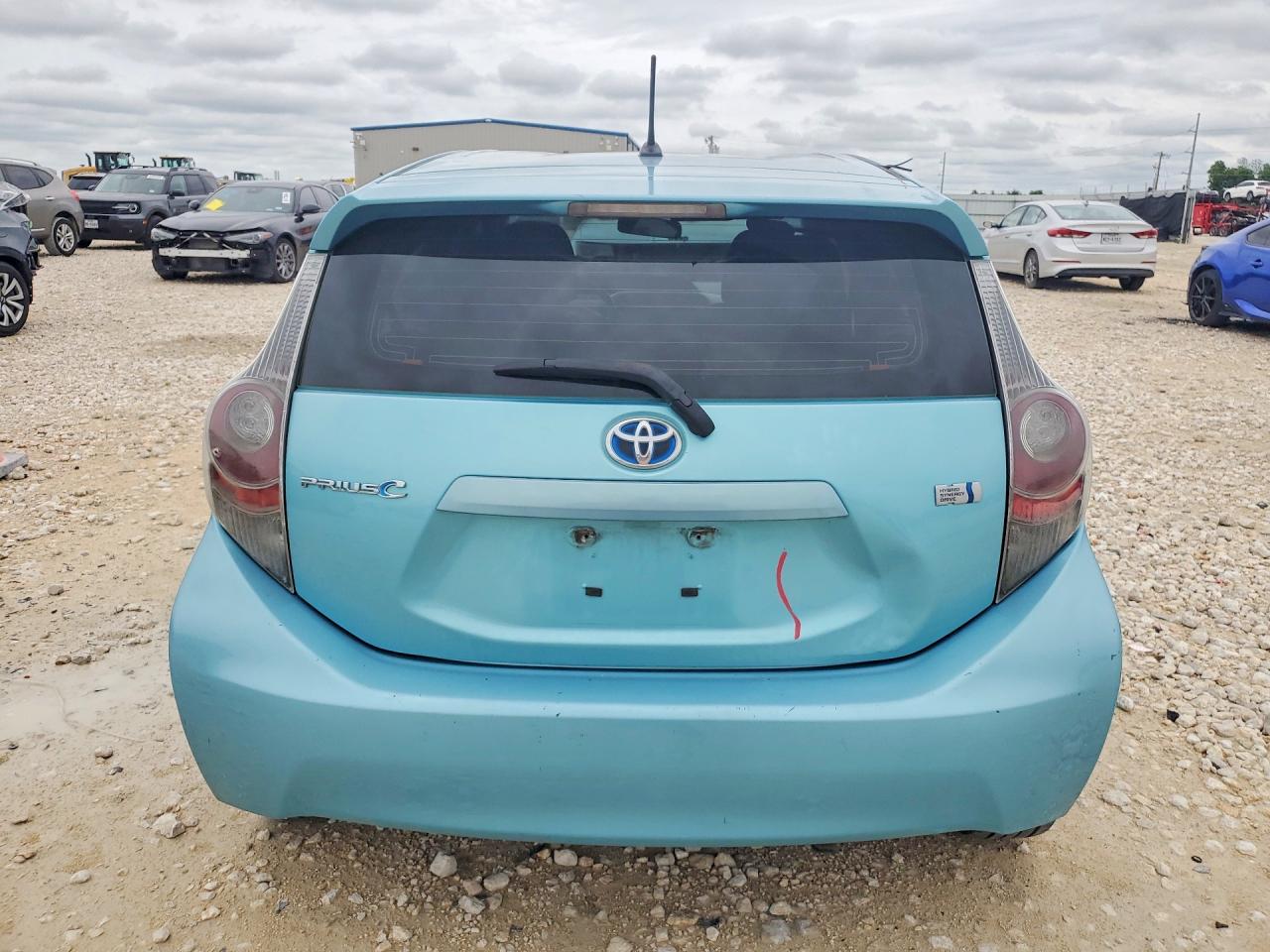 2012 Toyota Prius C VIN JTDKDTB37C1018273 COPART salvage auction — Front End, TX - SALVAGE VEHICLE TITLE (P), sold $475 on 2026-07-09 (photo 6)