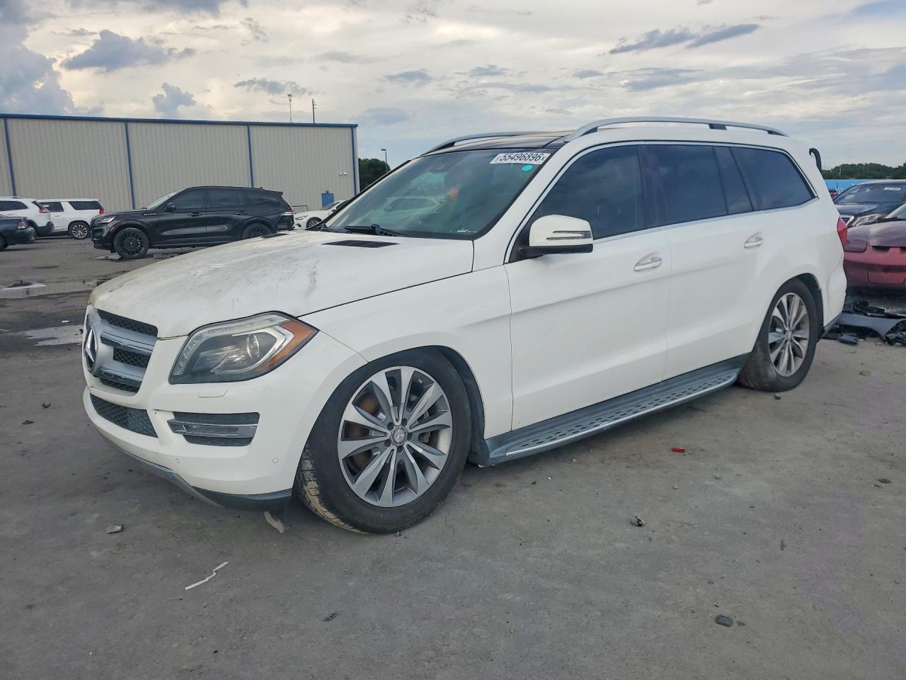 2014 Mercedes-Benz GL-Class VIN 4JGDF7CE7EA423509 COPART salvage auction — Stripped, FL - CERTIFICATE OF TITLE, sold $2,950 on 2026-07-01 (photo 1)