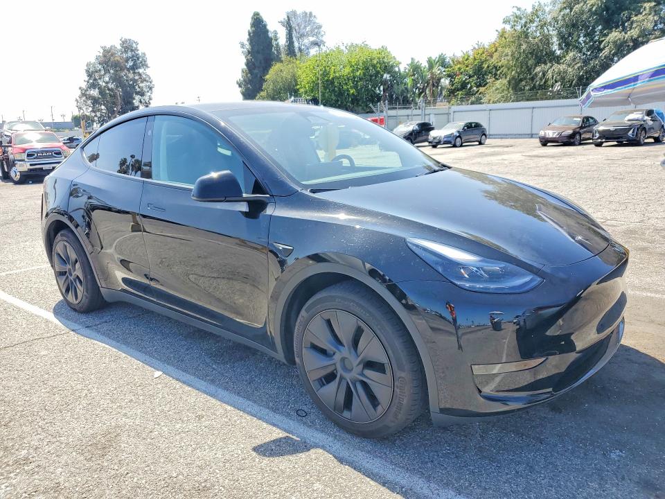 2024 Tesla Model y VIN 7SAYGDED5RF115258 COPART salvage auction — REAR END, Ca - Salvage Certificate, sold $15,000 on 2026-07-24 (photo 4)