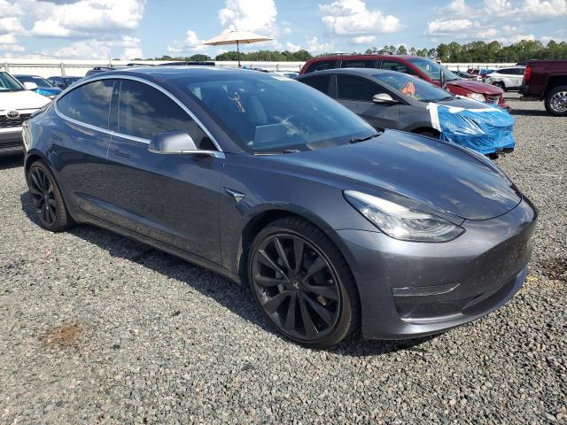 2019 Tesla Model 3 VIN 5YJ3E1EB4KF529972 COPART salvage auction — SIDE, Fl - Cert Of Title Slvg Rebuildable, sold $6,700 on 2026-07-10 (photo 4)