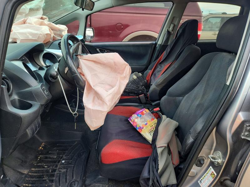 2009 Honda Fit VIN JHMGE87409S053515 COPART salvage auction — FRONT END, IL - JUNKING CERT OF A VEHICLE, sold $275 on 2026-07-21 (photo 7)