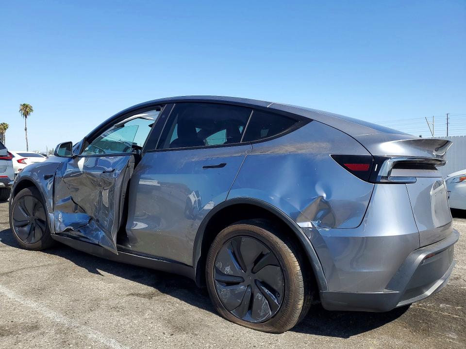 2026 Tesla Model y VIN 7SAYGDED7TF416136 COPART salvage auction — SIDE, Ca - Salvage Certificate, sold $18,000 on 2026-07-17 (photo 2)