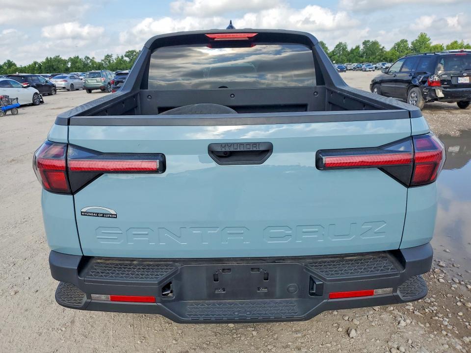 2024 Hyundai Santa cruz VIN 5NTJB4AE6RH099540 COPART salvage auction — FRONT END, Tx - Certificate Of Title, sold $11,800 on 2026-07-28 (photo 6)
