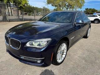 2015 BMW 7er VIN WBAYB6C5XFD965910 COPART salvage auction — DAMAGE HISTORY, Fl - Cert Of Title Slvg Rebuildable (P), sold $6,700 on 2026-07-28 (photo 1)
