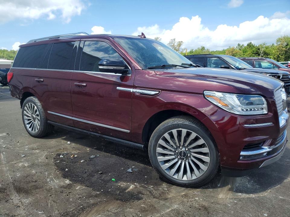 2020 Lincoln Navigator VIN 5LMJJ2LT7LEL21584 COPART salvage auction — REAR END, FL - CERT OF TITLE SLVG REBUILDABLE, sold $12,800 on 2026-07-20 (photo 4)