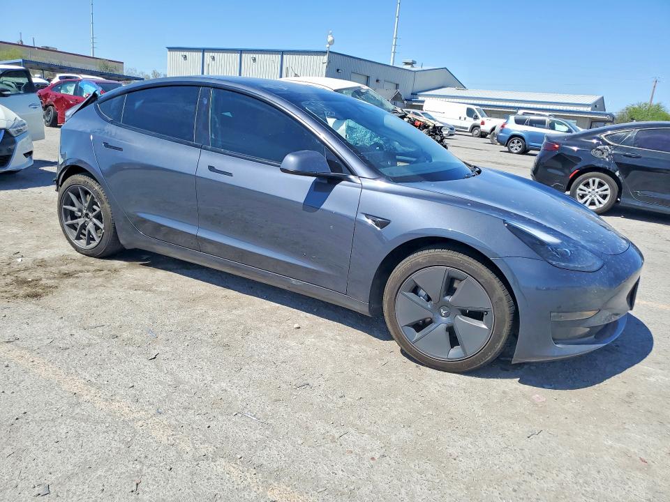 2023 Tesla Model 3 VIN 5YJ3E1EA9PF707938 COPART salvage auction — SIDE, Nv - Salvage Title, sold $4,050 on 2026-07-23 (photo 4)