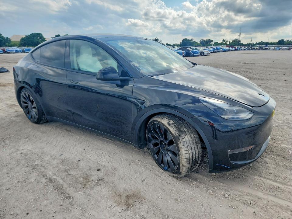 2023 Tesla VIN 7SAYGDEF5PF822990 COPART salvage auction — FRONT END, Fl - Cert Of Title Slvg Rebuildable, sold $15,700 on 2026-07-16 (photo 4)