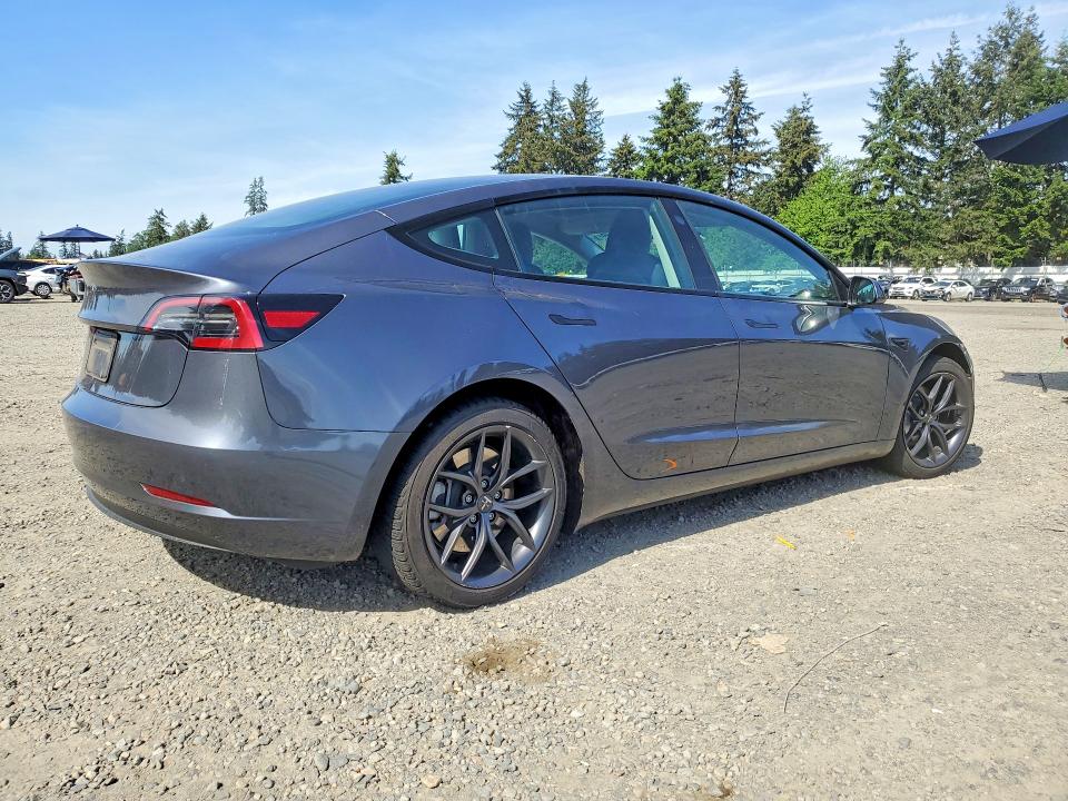 2023 Tesla Model 3 VIN 5YJ3E1EA4PF701982 COPART salvage auction — SIDE, Salvage Title, sold $7,800 on 2026-07-10 (photo 3)