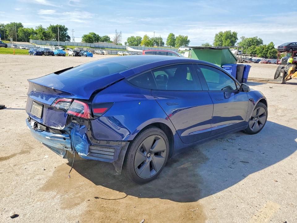 2023 Tesla Model 3 VIN 5YJ3E1EA9PF490794 COPART salvage auction — REAR END, Salvage Title, sold $7,400 on 2026-09-01 (photo 3)
