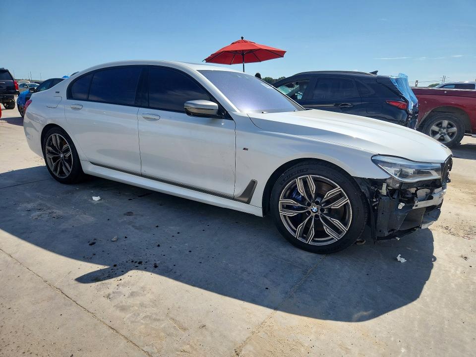 2019 BMW M760i xdrive VIN WBA7H6C58KG615050 COPART salvage auction — UNDERCARRIAGE, Tx - Salvage Vehicle Title, sold $11,100 on 2026-07-09 (photo 4)