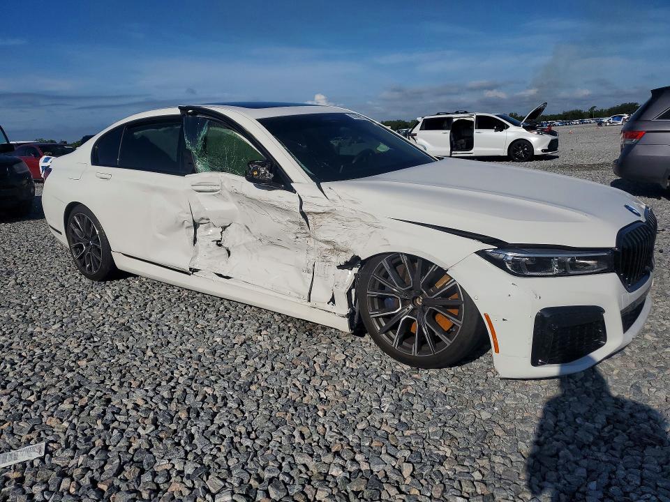 2021 BMW 7er VIN WBA7U2C00MCF14655 COPART salvage auction — SIDE, Fl - Cert Of Title Slvg Rebuildable, sold $16,200 on 2026-08-04 (photo 4)