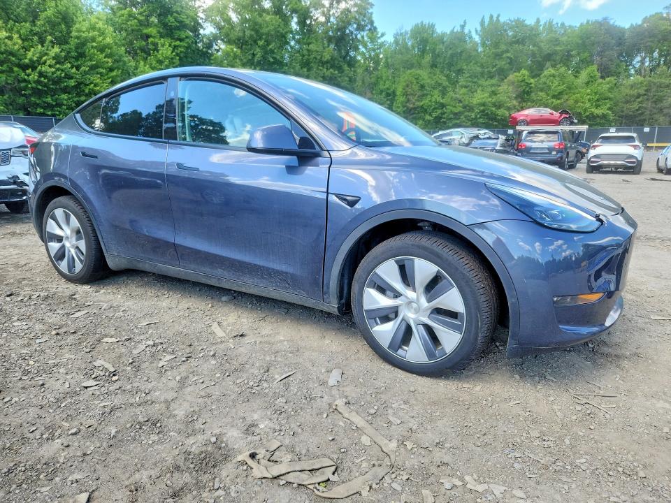 2023 Tesla Model y VIN 7SAYGDEE4PA164227 COPART salvage auction — FRONT END, MD - CERT OF SALVAGE > 75% DAMAGE, sold $10,300 on 2026-07-28 (photo 4)