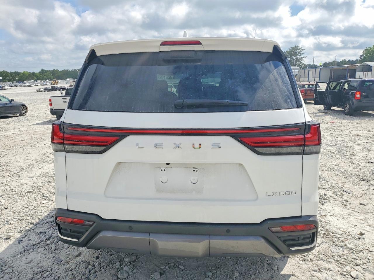 2025 Lexus LX 600 VIN JTJGB7CX2S4071218 COPART salvage auction — Front End, GA - CERT OF TITLE-SALVAGE, sold $85,000 on 2026-07-01 (photo 6)
