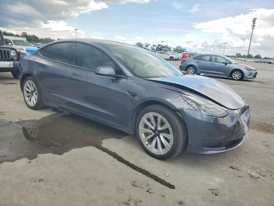 2023 Tesla VIN 5YJ3E1EAXPF669328 COPART salvage auction — FRONT END, Fl - Cert Of Title Slvg Rebuildable, sold $11,500 on 2026-07-13 (photo 4)