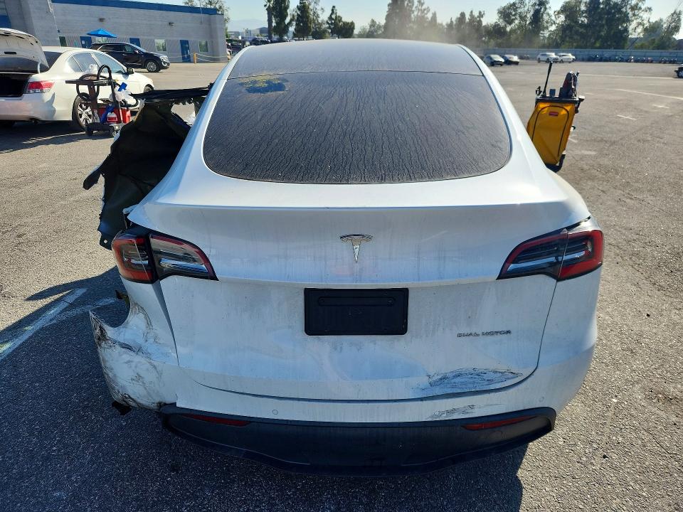 2021 Tesla Model y VIN 5YJYGDEEXMF090520 COPART salvage auction — REAR END, Ca - Salvage Certificate, sold $7,000 on 2026-07-02 (photo 6)