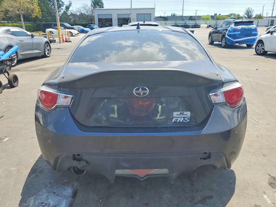 2016 Scion VIN JF1ZNAA13G9701004 COPART salvage auction — FRONT END, Fl - Cert Of Title Slvg Rebuildable, sold $1,050 on 2026-07-29 (photo 6)