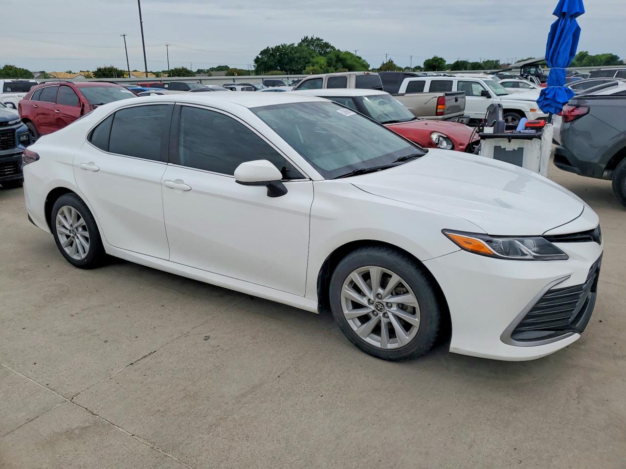 2023 Toyota Camry VIN 4T1C11AKXPU120094 COPART salvage auction — Hail, TX - SALVAGE VEHICLE TITLE, sold $10,100 on 2026-07-02 (photo 4)