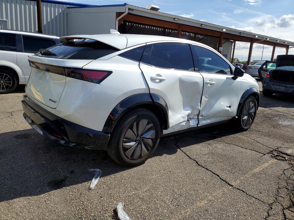2024 Nissan Ariya VIN JN1BF0BA1RM432070 COPART salvage auction — SIDE, Co - Salvage Title, sold $325 on 2026-07-28 (photo 3)