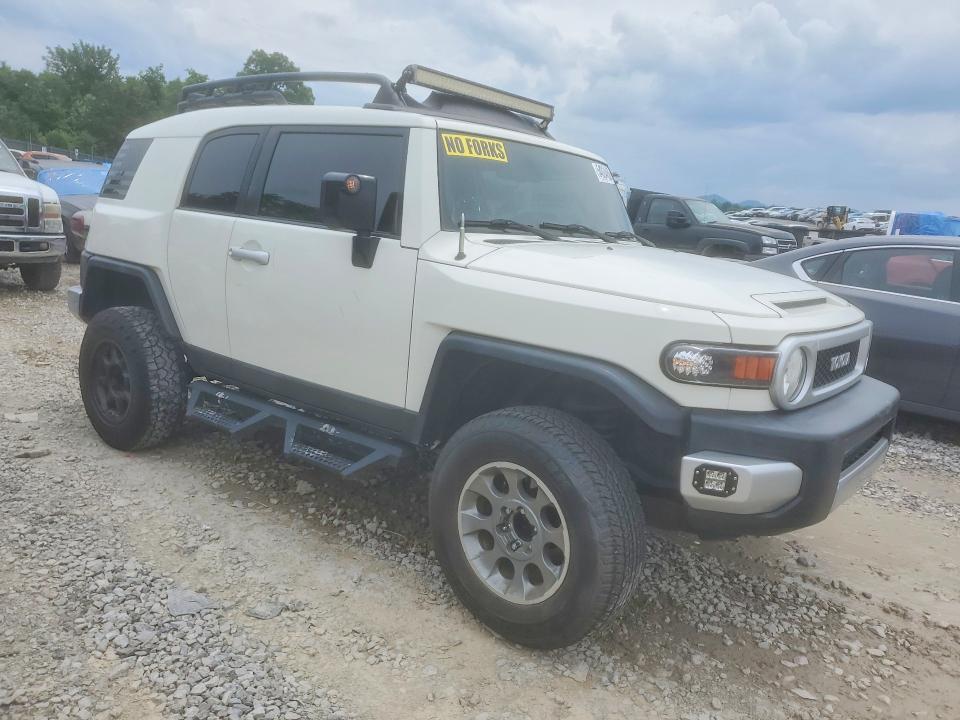 2011 Toyota Fj cruiser VIN JTEBU4BFXBK104312 COPART salvage auction — SIDE, Tn - Salvage Certificate, sold $7,700 on 2026-07-30 (photo 4)