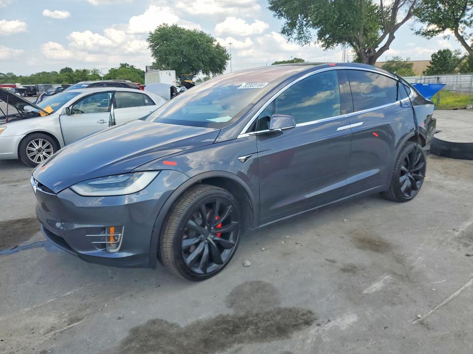2020 Tesla Model x VIN 5YJXCBE49LF248542 COPART salvage auction — REAR END, Fl - Cert Of Title Slvg Rebuildable, sold $13,200 on 2026-07-09 (photo 1)
