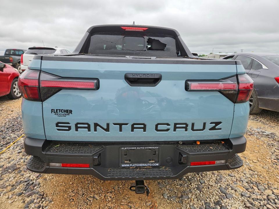 2023 Hyundai Santa cruz VIN 5NTJC4AE6PH061980 COPART salvage auction — HAIL, Mo - Certificate Of Title, sold $8,500 on 2026-07-08 (photo 6)