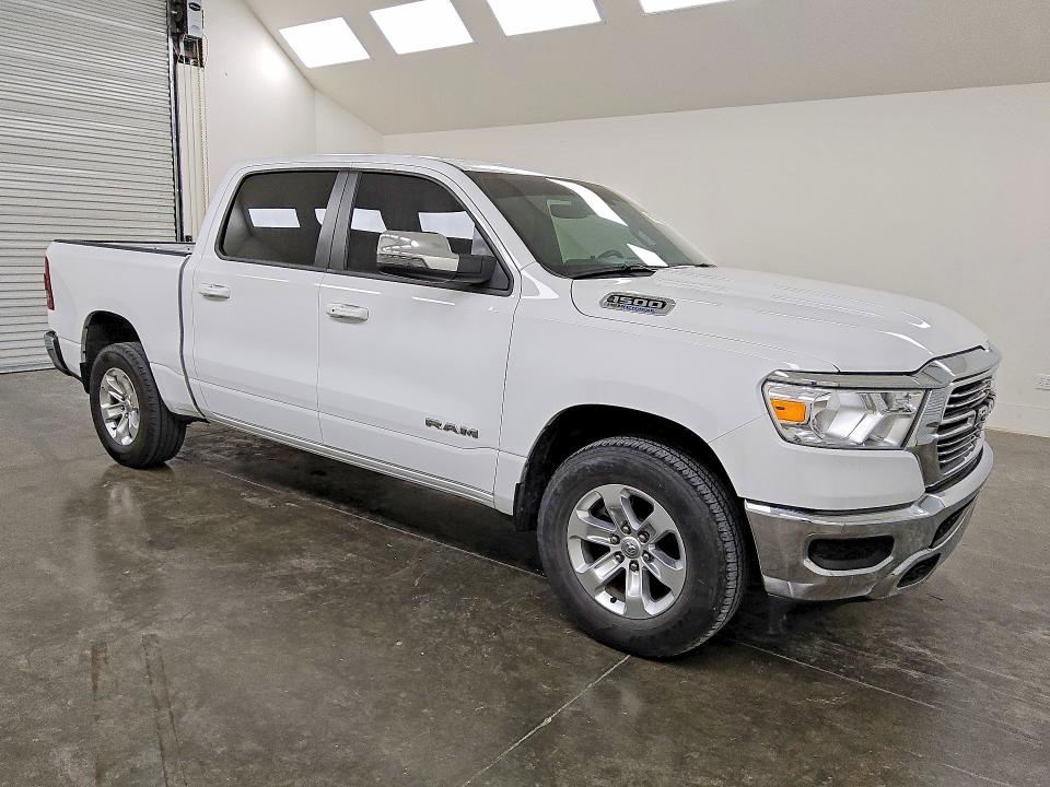 2024 Ram 1500 VIN 1C6RREJT1RN219172 COPART salvage auction — MINOR DENT/SCRATCHES, Tx - Certificate Of Title, sold $26,500 on 2026-07-02 (photo 4)