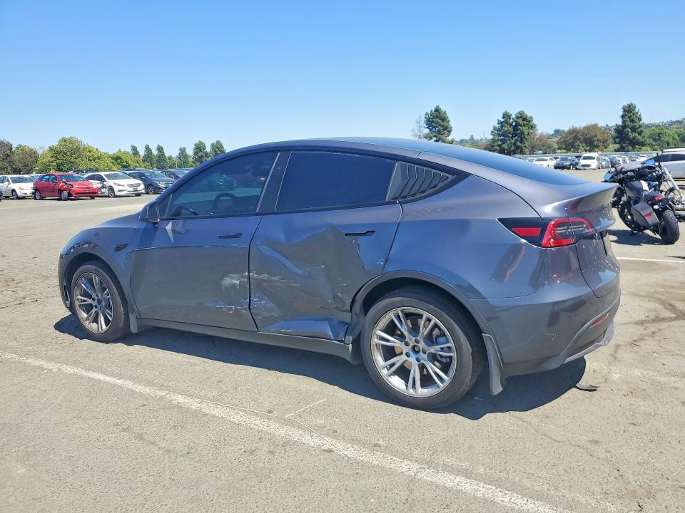 2023 Tesla Model y VIN 7SAYGDEE3PF873394 COPART salvage auction — SIDE, CA - SALVAGE CERTIFICATE, sold $13,200 on 2026-07-31 (photo 2)