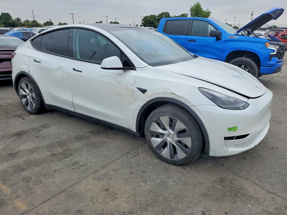2023 Tesla Model y VIN 7SAYGAEEXPF742736 COPART salvage auction — SIDE, Ca - Salvage Certificate, sold $14,200 on 2026-07-29 (photo 4)