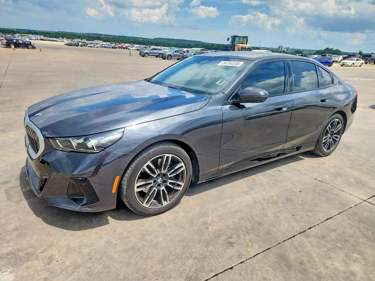 2025 BMW 5 Series VIN WBA43FJ03SCU14981 COPART salvage auction — Vandalized, TX - SALVAGE VEHICLE TITLE, sold $34,750 on 2026-08-06 (photo 1)