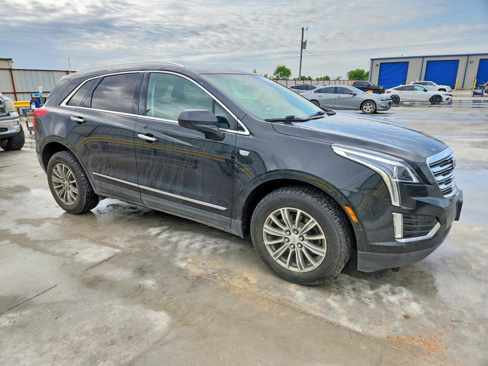 2019 Cadillac VIN 1GYKNDRS5KZ176914 COPART salvage auction — HAIL, Tx - Certificate Of Title, sold $10,700 on 2026-07-14 (photo 4)
