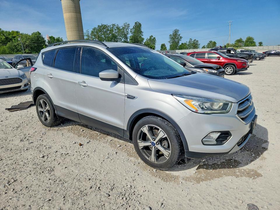 2017 Ford Escape VIN 1FMCU0G94HUB84476 COPART salvage auction — FRONT END, Mi - Certificate Of Title, sold $2,600 on 2026-07-09 (photo 4)