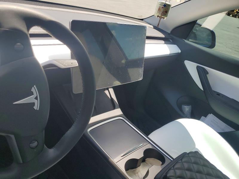 2022 Tesla Model y VIN 7SAYGDEE6NF339593 COPART salvage auction — SIDE, Ca - Salvage Certificate, sold $5,700 on 2026-07-08 (photo 9)