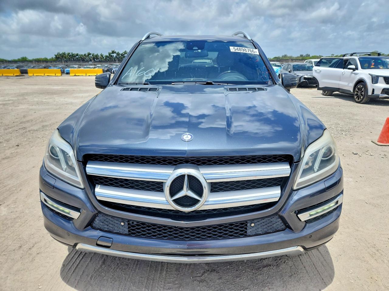 2016 Mercedes-Benz GL-Class VIN 4JGDF6EE5GA671025 COPART salvage auction — Minor Dent/Scratches, FL - CERTIFICATE OF TITLE (P), sold $4,950 on 2026-07-01 (photo 5)