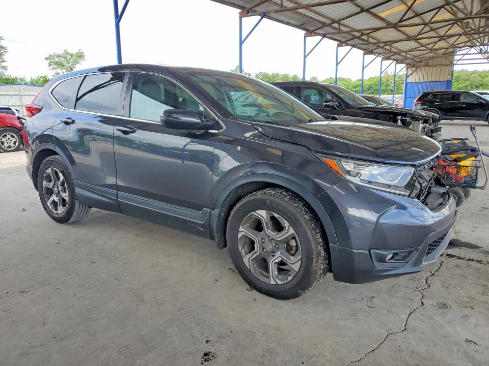 2018 Honda Cr-v VIN 7FARW1H53JE027826 COPART salvage auction — ROLLOVER, Fl - Certificate Of Title, sold $7,000 on 2026-07-09 (photo 4)