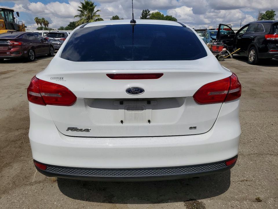 2017 Ford Focus VIN 1FADP3F28HL223183 COPART salvage auction — SIDE, Salvage Title, sold $800 on 2026-07-10 (photo 6)