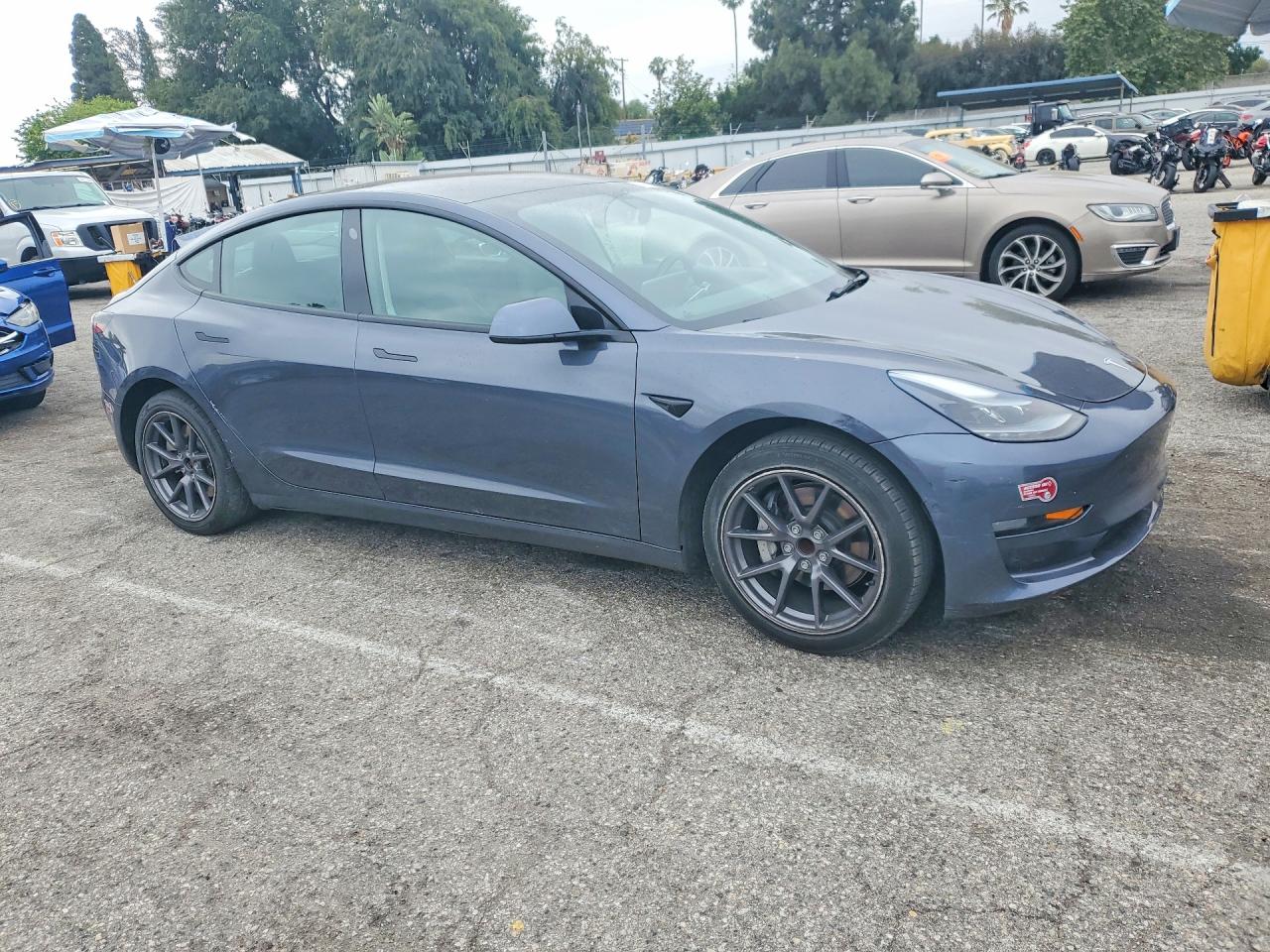 2021 Tesla Model 3 VIN 5YJ3E1EA5MF100589 COPART salvage auction — Rear End, CA - SALVAGE CERTIFICATE, sold $8,500 on 2026-07-10 (photo 4)